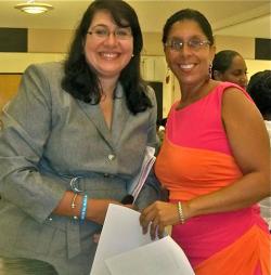 Dr. Lillian Santos, left, and Yvonne Galiber at Saturday's cancer awareness conference. Dr. Lillian Santos, left, and Yvonne Galiber at Saturday's cancer awareness conference.